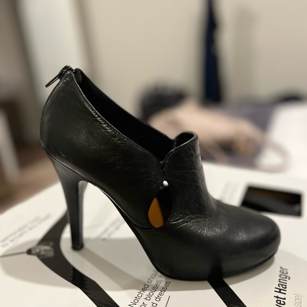 Nine West black high heel ankle boots.